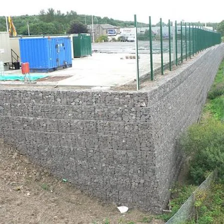 Gabion retaining wall supporting an embankment