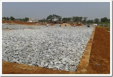 Stone soling layer spread over a prepared area