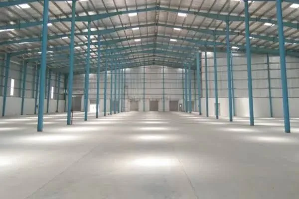 Large industrial hall with a smooth concrete floor